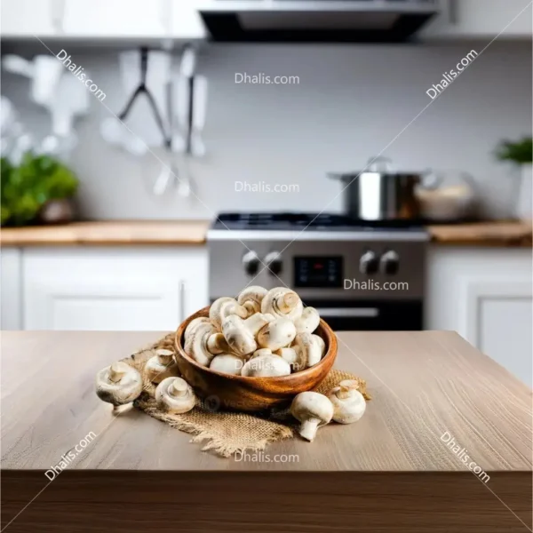 Fresh and sliced button mushrooms with parsley, ideal for cooking or adding to dishes